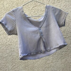 Light periwinkle cropped top with ruffles and buttons